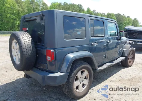 2007 Jeep Wrangler Unlimited Sahara from USA, damaged, VIN 1J4GA59117L216687